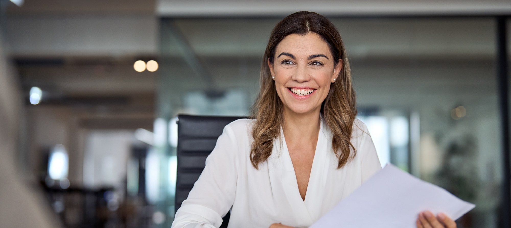 Smiling mature business woman hr manager at job interview office meeting.